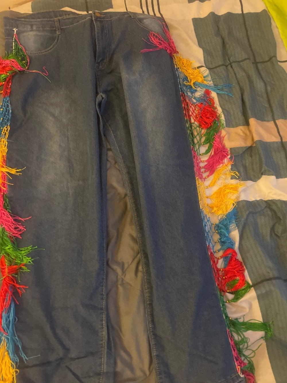 Jeans with tassles